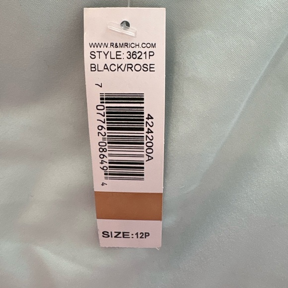 High/low black top with black and pink patterned skirt attached. - Picture 5 of 9